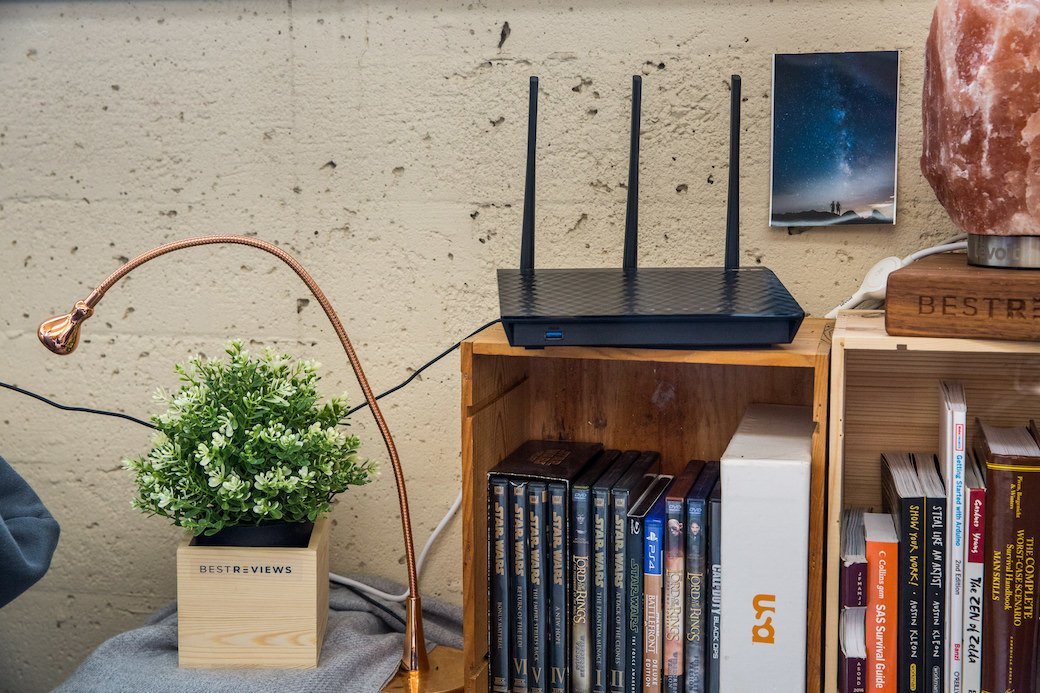 A wireless router on a shelf