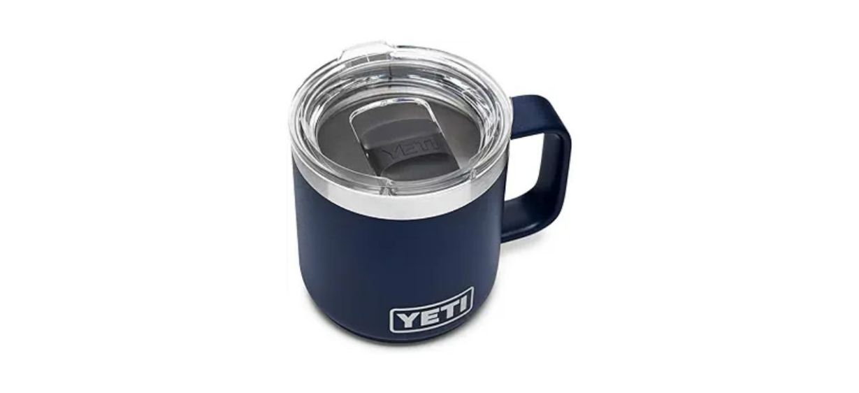 navy blue Yeti Rambler mug on white background