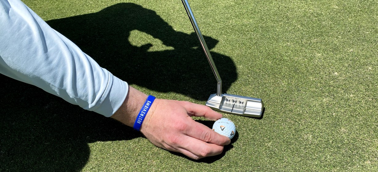 A golf ball and a Scotty Cameron Super Select Newport 2.5 Plus putter