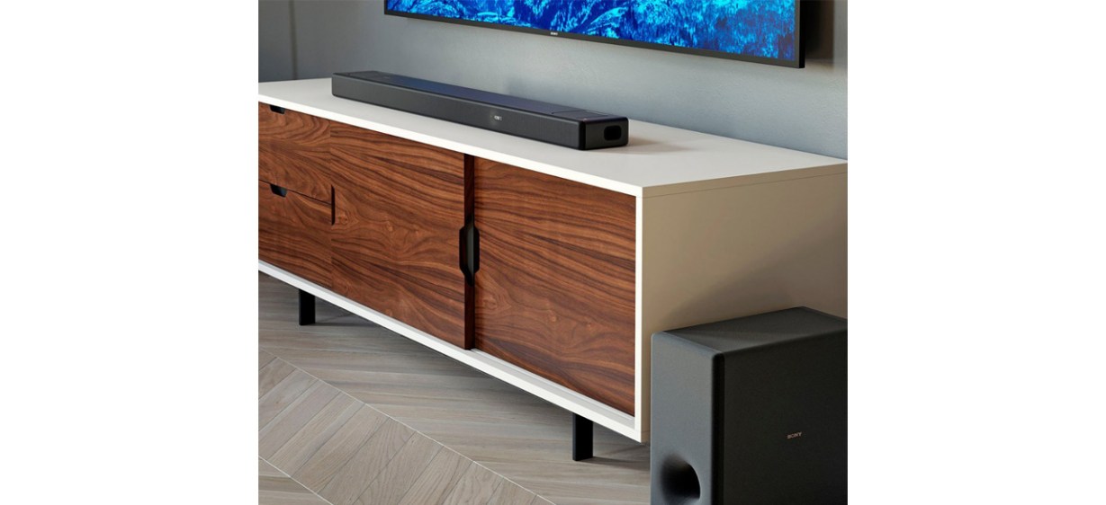 Sony HT-A5000 Dolby Atmos Smart Soundbar on shelf beneath TV